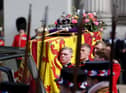 The Bearer Party transfer the coffin of Queen Elizabeth II, draped in the Royal Standard