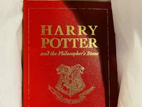 The leather-bound special 15th  anniversary edition of Harry Potter and the Philosophers Stone -  published exclusively for the competition in 2012.