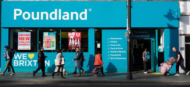 Pedestrians walk past a Poundland shop in Brixton, south London on February 7, 2022. - The Bank of England said Britain's annual inflation rate would peak at 7.25 percent in April, compared with 5.4 percent last December, which was already near a 30-year high. (Photo by Niklas HALLE'N / AFP) (Photo by NIKLAS HALLE'N/AFP via Getty Images)