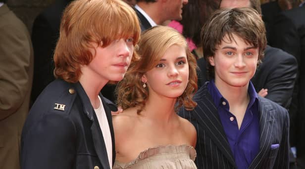 Actor Rupert Grint, Actress Emma Watson, and Actor Daniele Radcliffe attend the Premiere of Harry Potter  (Thos Robinson/Getty Images)