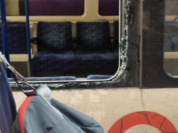 A fire broke out on the London underground this afternoon, forcing passengers to smash the windows to escape.  Picture by Kyra Chan @kyra_kaixin on Twitter