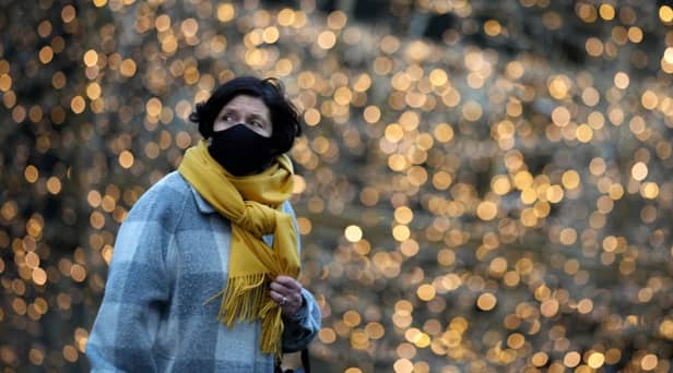 Failure to cover your face could see you hit with a £200 fine (image: Getty Images)