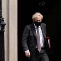 Prime Minister Boris Johnson leaves 10 Downing Street to attend the weekly Prime Ministers Questions in Parliament on April 21 (Photo by Dan Kitwood/Getty Images)