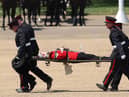 Three soldiers fainted during the Colonel’s Review at Horse Guards Parade in London today
