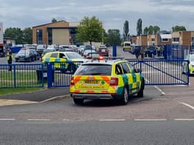 A teenage boy has been arrested after a teacher was stabbed at a secondary school in Tewkesbury, Gloucestershire 