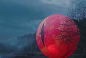 The giant orange 'eye' has appeared is the latest Alton Towers promo for a new ride launch.