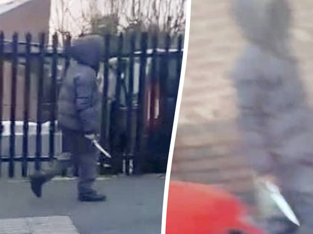 The moment a hooded knifeman casually walked down the street brandishing a huge blade near a Birmingham primary school. Picture:  Birmz Is Grime / SWNS
