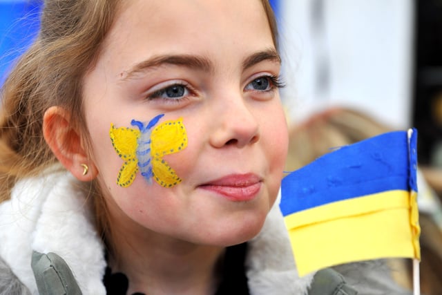 Residents and visitors at Arundel united in support of Ukraine. Pic S Robards SR2203061 SUS-220703-103213001
