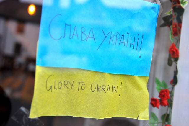 Residents and visitors at Arundel united in support of Ukraine. Pic S Robards SR2203061 SUS-220703-102912001