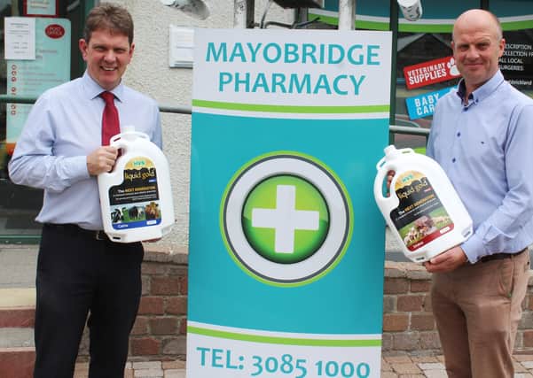 Pharmacist Paul O'Hare and HVS Animal Health's Paul Elwood looking forward to the series of promotions that will mark the 20th anniversary of Mayobridge Pharmacy next week