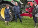 Agriculture Minister Edwin Poots MLA (right) and Economy Minister Diane Dodds MLA (left) with Co Tyrone man William Sayers.