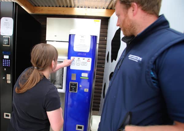 23/07/20 McAuley Multimedia..Portrush Dairy farmers William and Alison Chestnutt pictured at their milk vending machine on their farm in Portrush.Pic Steven McAuley/McAuly Multimedia