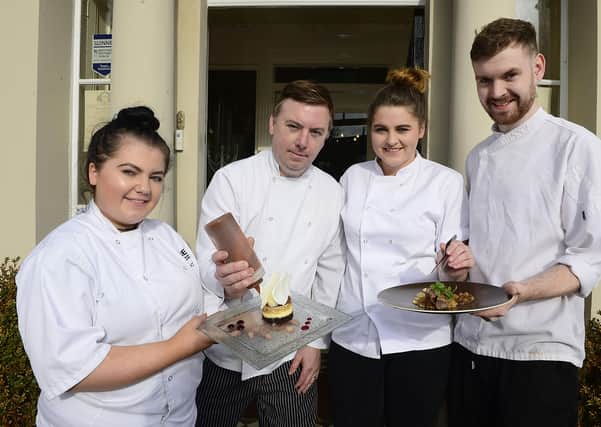 Pacemaker Press Belfast 17-10-2019:   Jim Mulholland, Chef and Proprietor of No 14 at the Georgian House will be tantalising taste buds as he mentors past and present students from SERC including (pictured) Courtney Johnston,Rachel Carson and Connor McGrogan, who have planned, prepared and will cook a mouth-watering Taster Menu featuring the best of Irish food at 1.00pm on Friday 25 October.  All profits will go towards supporting 6 young culinary students who have reached the UK Regional Finals of WorldSkills.  
Pictured By: Arthur Allison.