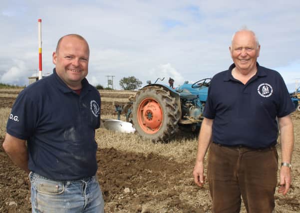Pictured at the Kircubbin, Portaferry and District Ploughing Match are former world champion David Gill from Annahilt, Co Down, and Brian McNally, chairman of the Kircubbin, Portaferry and District Ploughing Society. The match, which was held at the Springwell Road, Groomsport, Co Down, last Sunday, on land kindly donate by Mr Ted Thompson, was the first that the society had held in eight years. Competitors came from across Northern Ireland and there were several from southern Ireland too. For full report and more photographs see this Saturday's Farming Life. Picture: Darryl Armitage