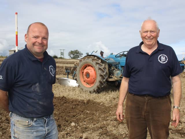 Pictured at the Kircubbin, Portaferry and District Ploughing Match are former world champion David Gill from Annahilt, Co Down, and Brian McNally, chairman of the Kircubbin, Portaferry and District Ploughing Society. The match, which was held at the Springwell Road, Groomsport, Co Down, last Sunday, on land kindly donate by Mr Ted Thompson, was the first that the society had held in eight years. Competitors came from across Northern Ireland and there were several from southern Ireland too. For full report and more photographs see this Saturday's Farming Life. Picture: Darryl Armitage