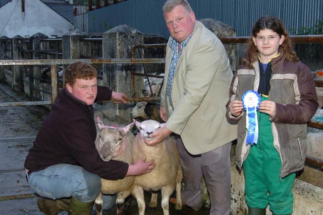 Pictured in May 2007 are Clive and Jade Hunter, Moneymore, Co Londonderry, with their second placed pair at the recent show and sale of spring lambs at Gortin Livestock mart, with Drew Heron, Broughshane, event judge