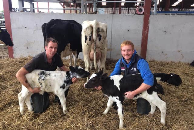Philip Patterson who is responsible for the day to day management of the herd with herdsman, Scott Cromwell, right