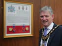 The Mayor of Causeway Coast and Glens Borough Council Alderman Mark Fielding pictured with the Letters Patent which is now on display in the Council Chamber in Cloonavin