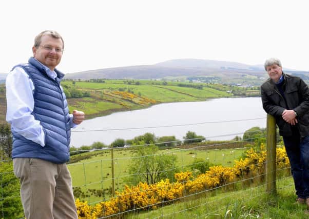 William Roulston and Joe Mahon at the site of the 19th hcentury Lough Ash agricultural school