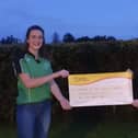 Rachel Rea and Kathryn Speers presenting ‘Friends of the Cancer Centre’ with a cheque of £2305.