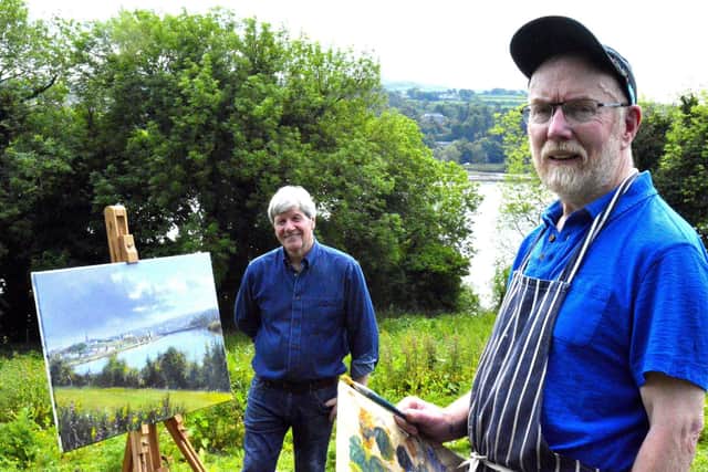 Artist Pat Cowley shows Joe Mahon how to capture the light on the banks of the Foyle