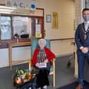 The Mayor, Cllr Peter Johnston, presented Jean with flowers and a card.