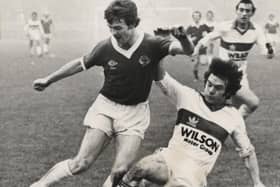 Linfield’s Johnny Jameson getting in a shot at the Glentoran goal despite the close attention of Glens’ defender Rab McCreery during the Big Two clash at Windsor Park, Belfast, in January 1980. Picture: Eddie Hanvey/News Letter archives