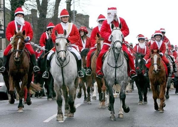 The Santas making their way through Saintfield on a previous charity ride