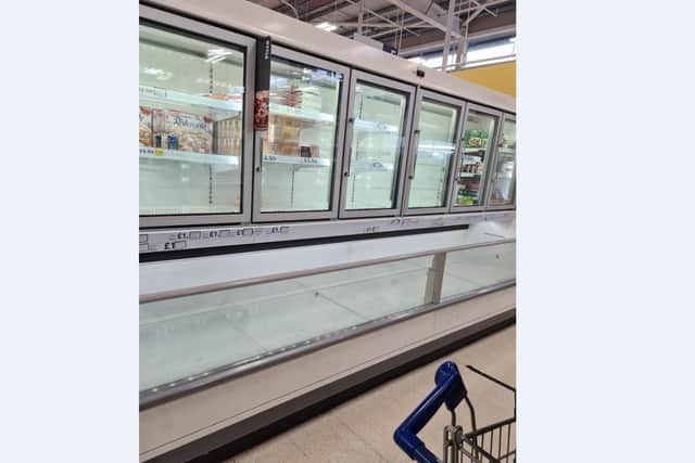 Shelves and freezers at Tesco Craigavon virtually empty, says customer.