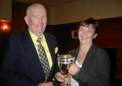 Mrs Linda Hayes presents the Sennen Cove Yearling National Cup to Len Russell.