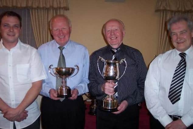 Top Prize-winners W & J Smyth collect awards from special guests Keith Kernohan (l) and George McDowell (r).