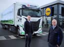 Lidl Northern Ireland & McCulla Launch Fully Green Transport Fleet: Lidl Northern Ireland has become the first retailer in the UK and Ireland to launch a fully green transport fleet powered by waste-to-energy generation, in partnership with leading local logistics company McCulla Transport. The new fleet of eight bio-methane powered trucks marks a major step forward in Northern Irelandâ€TMs goal to reduce carbon emissions and will reduce the retailerâ€TMs carbon emissions of these vehicles by up to 93%. Pictured with one of the new trucks are (L-R) Conor Boyle, Regional Director of Lidl Northern Ireland and Ashley McCulla, Chairman of McCulla Transport.