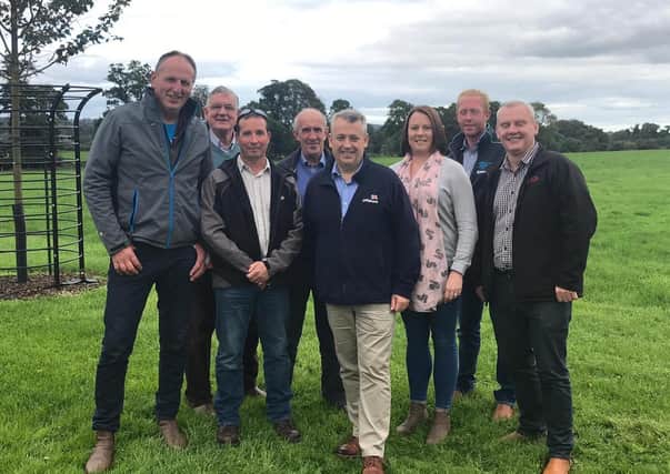 Trip to Dowth (left to right as you look at it ): Brian Cromie, William Hanna, Jim Crothers (deputy Group Chairman), Hugh Bradley, Dr John Gilliland, Diane Simpson (Group Manager), James Annett and John McCallister (Group Chairman)