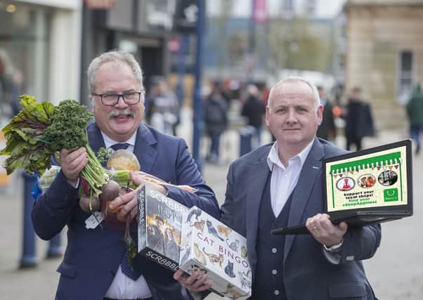 Jamie Hamill Coleraine Bid Manager with Ian Donaghey MBE Chair of Coleraine BID at the launch of Coleraine's Shopappy scheme. PICTURE STEVEN MCAULEY/MCAULEY MULTIMEDIA