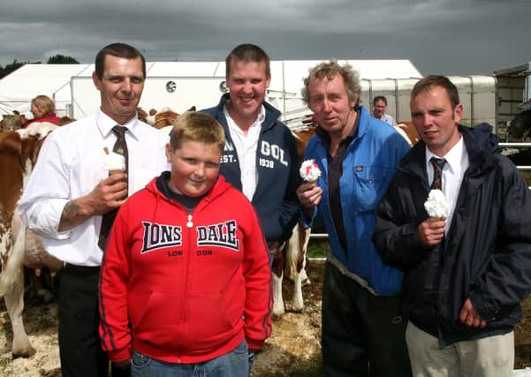 Kenny Nicholl, Ken Nicholl jnr, Stuart Baxter, Ronnie Erwin and David Wilson enjoying an ice cream at Antrim Show. AT31-487AC