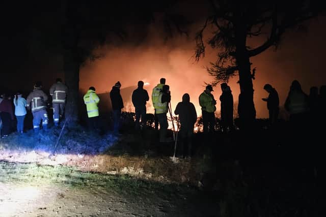 The local community, farmers and Fire Service at the scene of a major gorse fire at Loughmacrory near Omagh