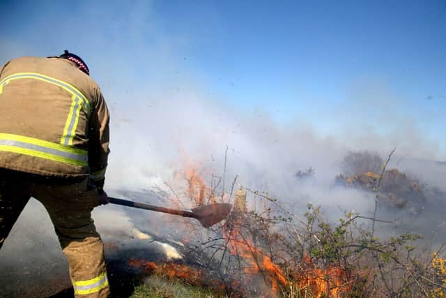 Fire-fighters are battling two large gorse fires in County Antrim.
PICTURE MCAULEY MULTIMEDIA