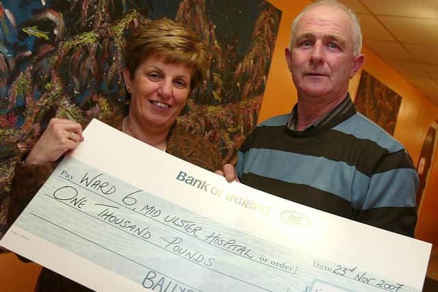 Pictured in December 2007 are Frank Bigmore, chairman of Ballyronan And District Vintage Club, presents a cheque for £1,000 to Mary O’Neill on behalf of Ward 6 Mid Ulster Hospital, Magherafelt, proceeds of collections and fundraising events which were organised by the club throughout the year. Picture: Simon Robinson