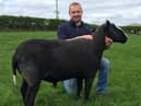 Jonny Watson from Ballymena who completed his Level 2 Agriculture Business Operations course in sheep production at Greenmount Campus in March this year pictured on his home farm