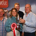 Kathryn Shaw presents the new Glebefarm Trophy to David Henderson, Champion Commercial Herd at the NI Beef SHorthorn Dinner. Judges Johnny Keane and Tom Staunton watch on. Pictures: Agri-Images