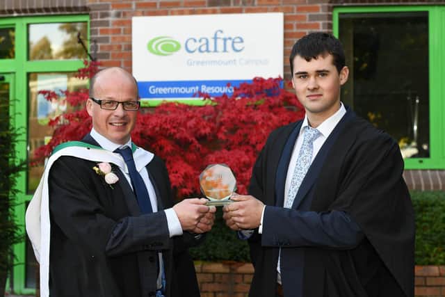 Ben McKinney (Maghera) was awarded with the 2021 Redrock Cup for being the best overall practical engineering student at the Greenmount Graduation by Mr Manus McHenry, Head of Agriculture Education, CAFRE.