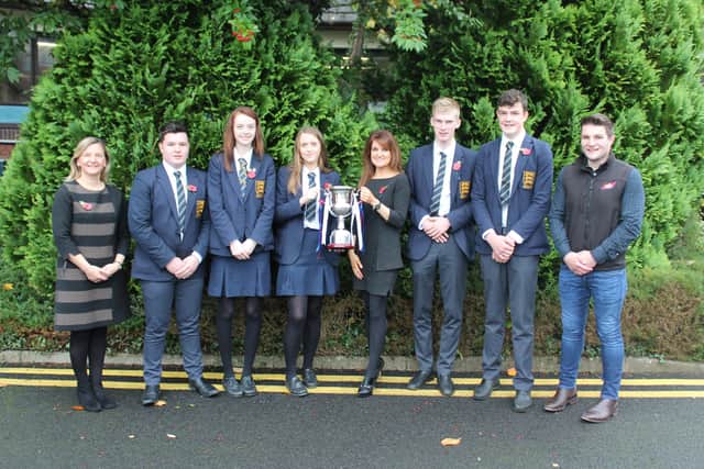 Ruth Maxwell (left) Principal of Omagh Academy and ABP's Stuart
Cromie (right) congratulate the members of the wining team from the
school that swept the boards in the 2020 ABP Angus Youth Challenge:
Allister Crawford, Jill Liggett, Joshua Keys, Tori Robson and James
Fleming. Also featured is geography and agriculture teacher Adele Lennox
(centre), who assisted with the coordination of the project