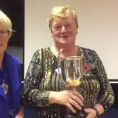 Joan Gray winner of the Rebecca McCourt Cup which was presented to her by president Elizabeth Gray