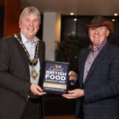The Mayor of Causeway Coast and Glens Borough Council Councillor Richard Holmes pictured with Great Taste Award winner Alastair Bell of Irish Black Butter.