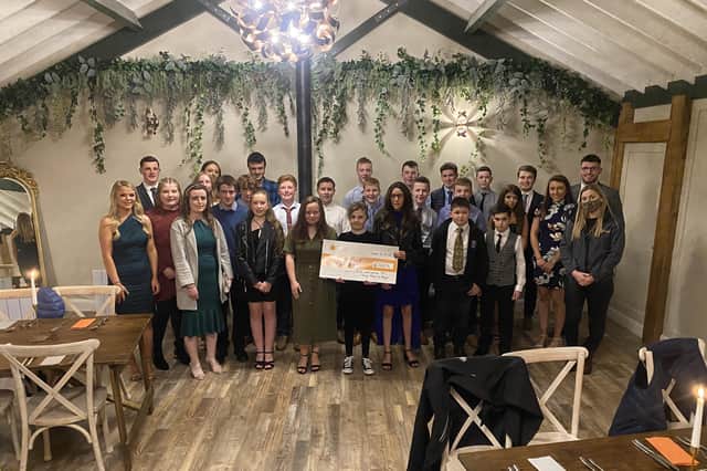 Kells and Connor YFC at the recent club dinner at the Carrie in Kells. The club presented an amazing £2,602.14 to the Cancer Fund for Children