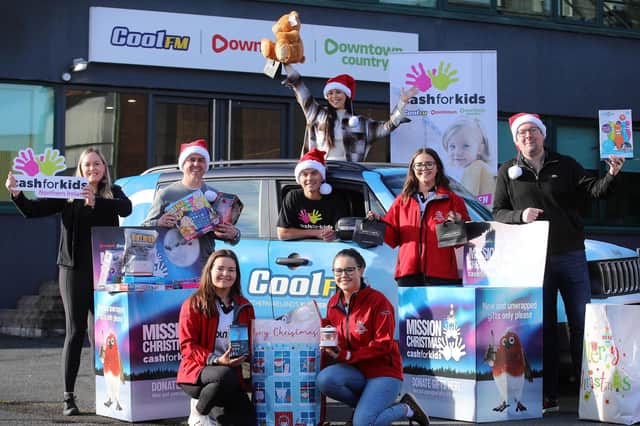 YFCU vice president Hannah Kirkpatrick (centre right) is joined by fellow members, Claire Ramay (front left) and Jayne Kirkpatrick (front right) from Kilraughts YFC to announce the organisation’s support for the 2021 Cash for Kids Mission Christmas Appeal. Also pictured are Lauren Baxter (left) Cash for Kids charity manager, the Cool FM Breakfast team – Pete Snodden, Paulo Ross and Rebecca McKinney - and Mark Corry, from the appeal sponsor Harry Corry