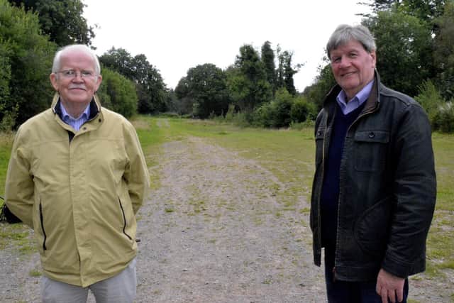 Pat McCusker and Joe at the former site of Ecclesville Manor.