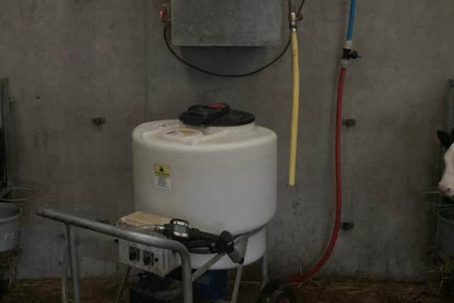 Positioning the water heater close to calves will reduce time spent transporting milk.