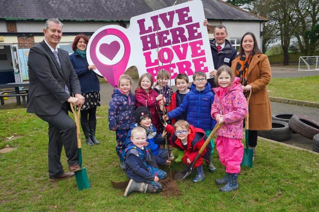 DAERA Minister Edwin Poots pictured launching the School Pollinator Garden Scheme with local children from Carr Primary School outside Lisburn with (L-R) Helen Tombs - Manager Live Here Love Here, Lee Stevenson Acting Principal - Carr Primary School and Dr Ian Humphrey - Chief Executive Keep Northern Ireland Beautiful.