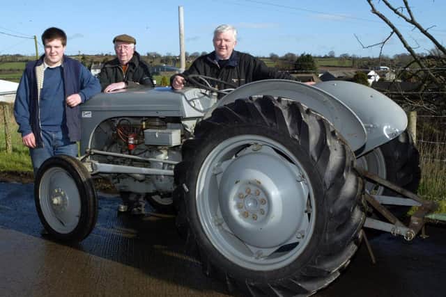 Mark Ross, assistant secretary, Glenavy and District Vintage Car Committee, Walter Jess, committee member and chairman of the Glenavy and District Vintage Car committee, and Alan Ross with a Ferguson T20 at the rally which was held in March 2007. Picture: Colm O’Reilly/Ulster Star archives